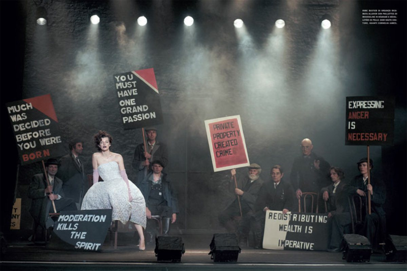 Illustration for article titled Incredibly Lovely: Milla Jovovich marches with Jenny Holtzer slogans in a dystopian future